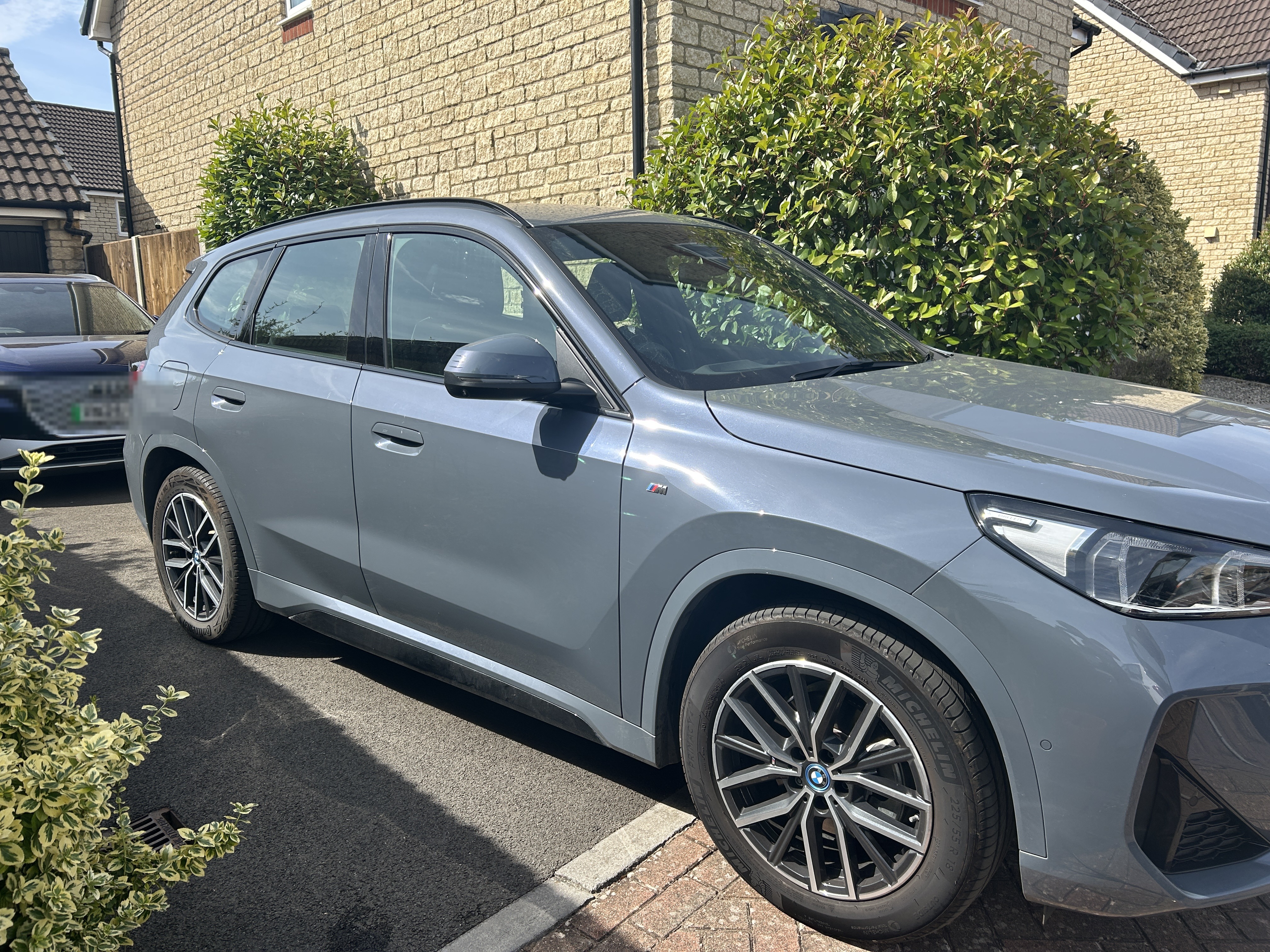 BMW iX1, side profile, after detail